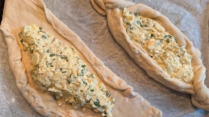 Khachapuri at various stages of shaping