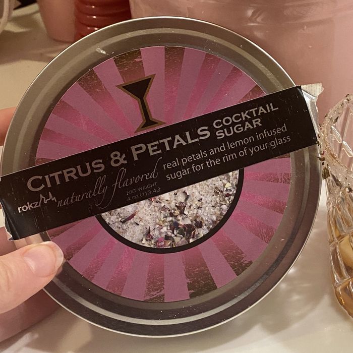 A jar of citrus petal-infused rim sugar.