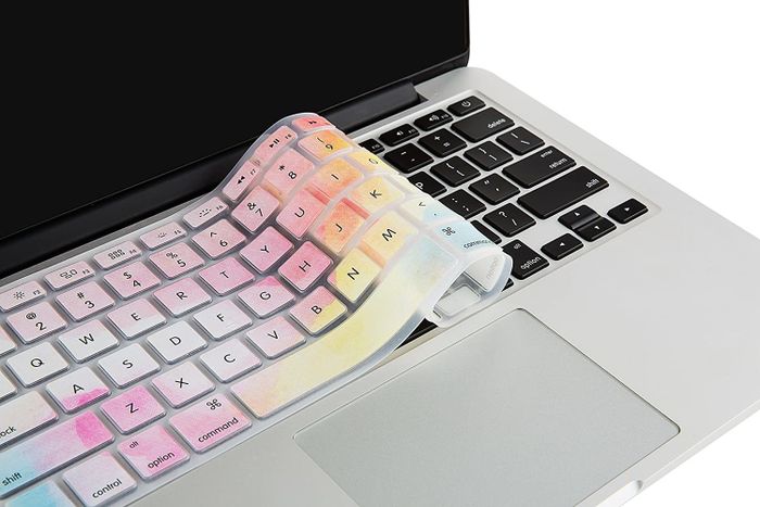 a vibrant keyboard cover placed on a Mac laptop