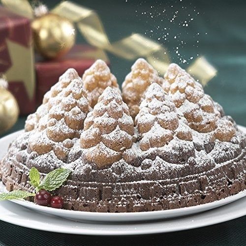 A beautifully crafted cake from the pan that resembles a magical forest