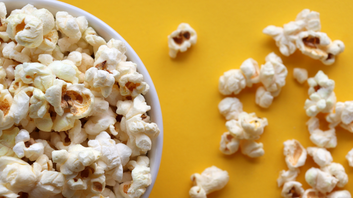A close-up image of a bowl filled with popcorn