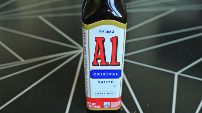 A close-up of an A1 barbecue sauce bottle