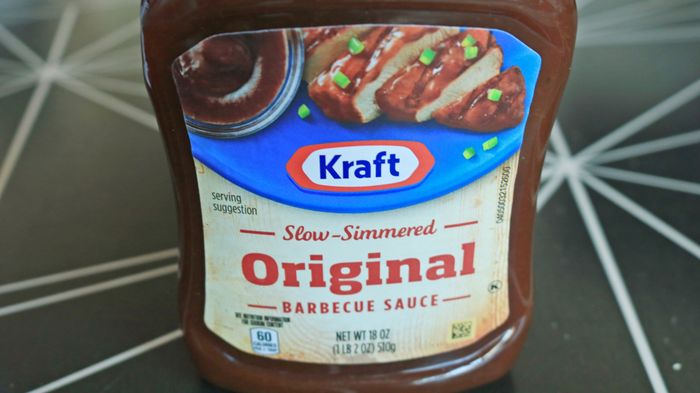 A close-up of a Kraft barbecue sauce bottle