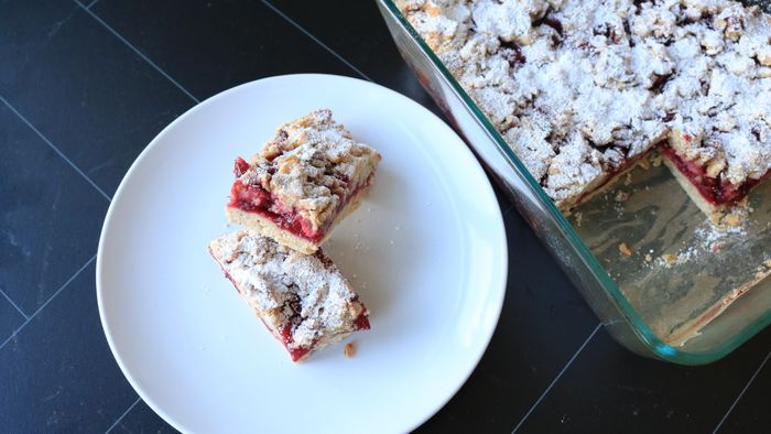 A plate of cranberry jam bars, ready to be enjoyed.