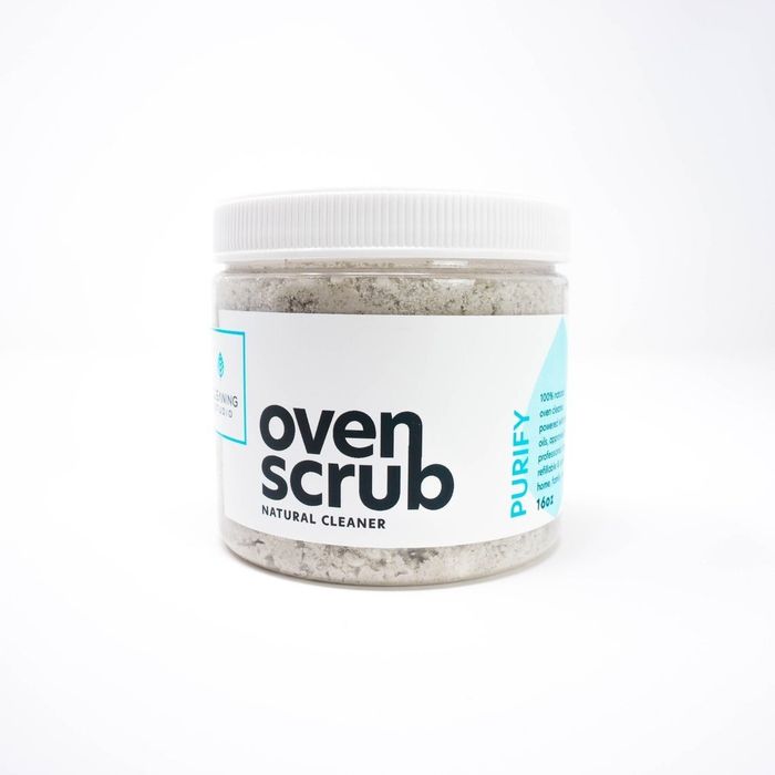 A jar containing the oven scrub product.