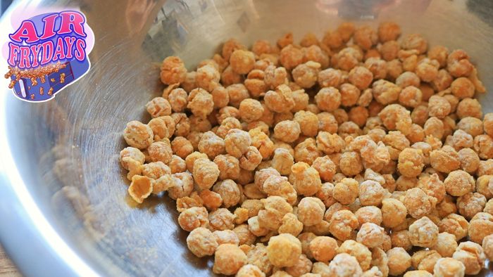 Air fried chickpeas served in a metal bowl.