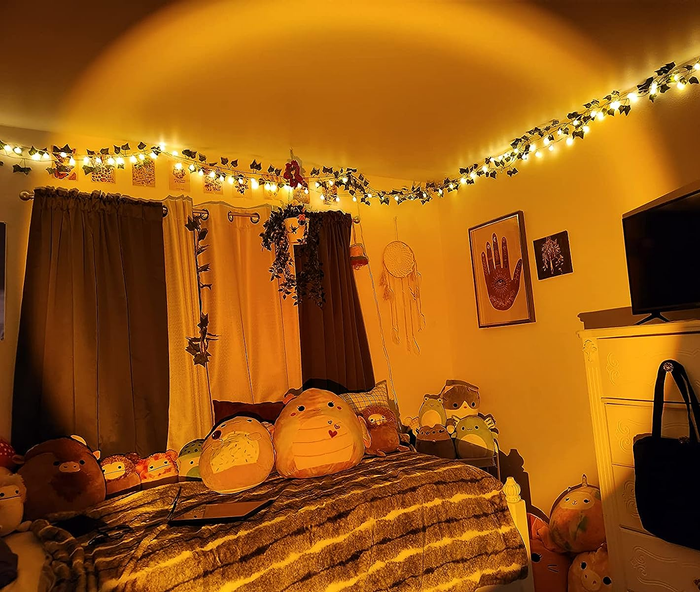 A sunset lamp casting warm, ambient light across a room.