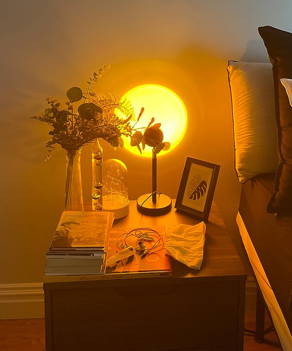 The sunset lamp focused on a wall, creating an intense cozy glow.