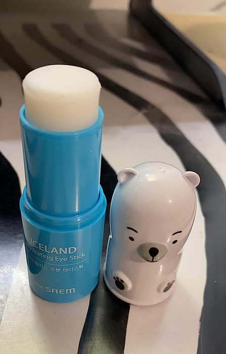 A reviewer's photo featuring the eye stick