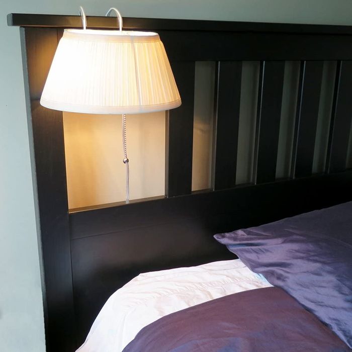 The light positioned perfectly over the headboard for convenience.