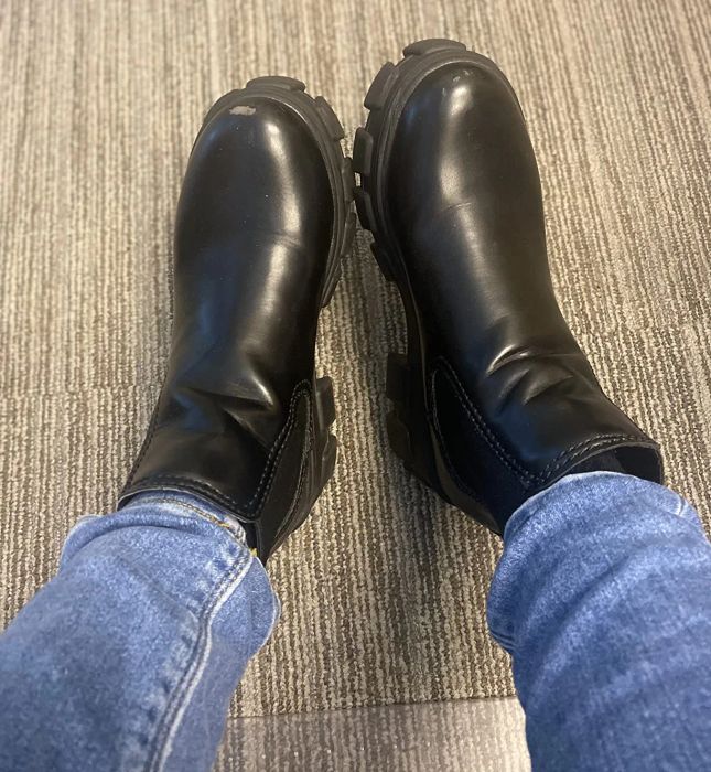 Reviewer rocking the black boots