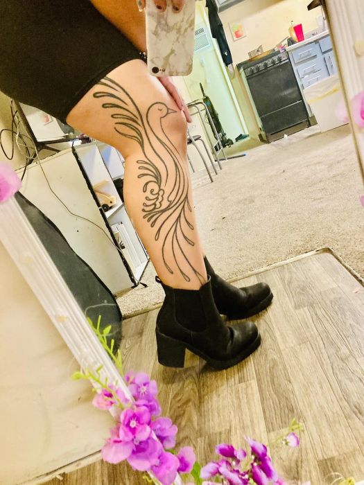 Reviewer styling the boots in black