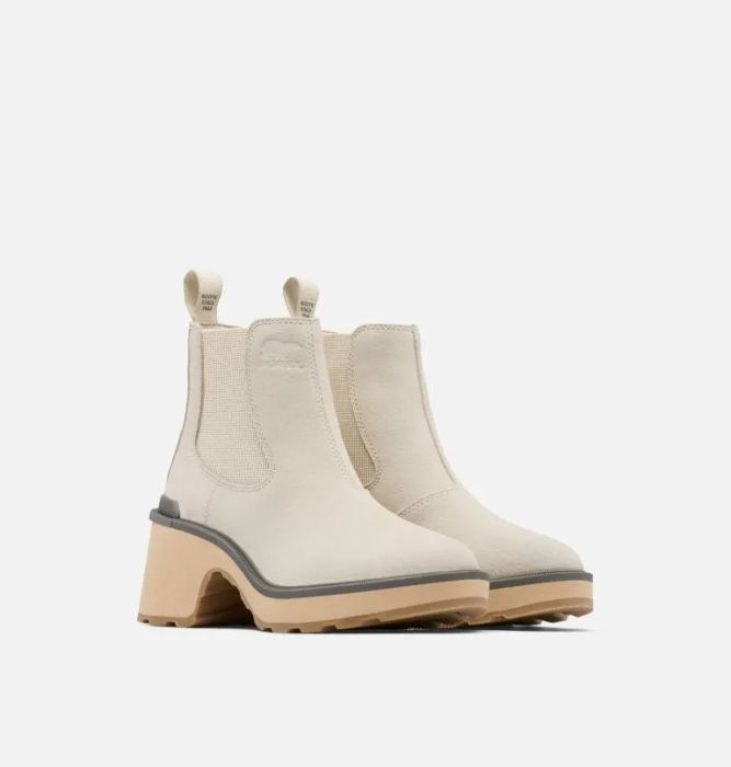 The beige boots with a chunky heel