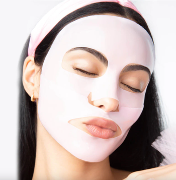 Camila Mendes sporting the pink hydrogel mask.