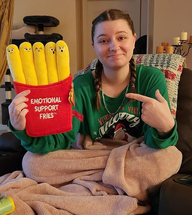 reviewer holding emotional support fries