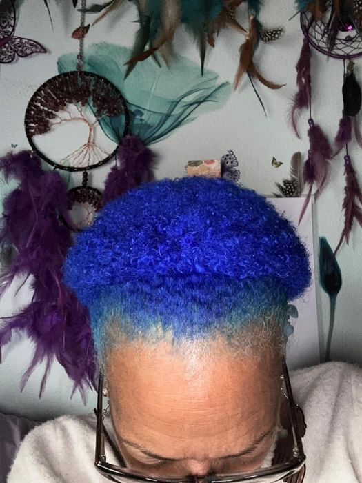 reviewer with vibrant blue hair