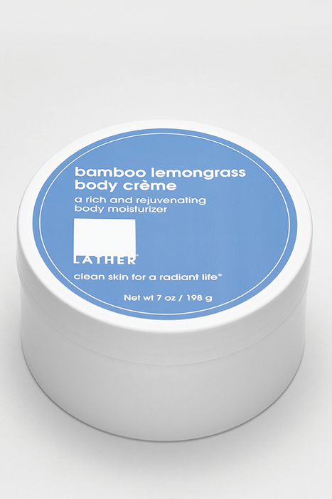 The distinctive blue and white container holding the body butter.