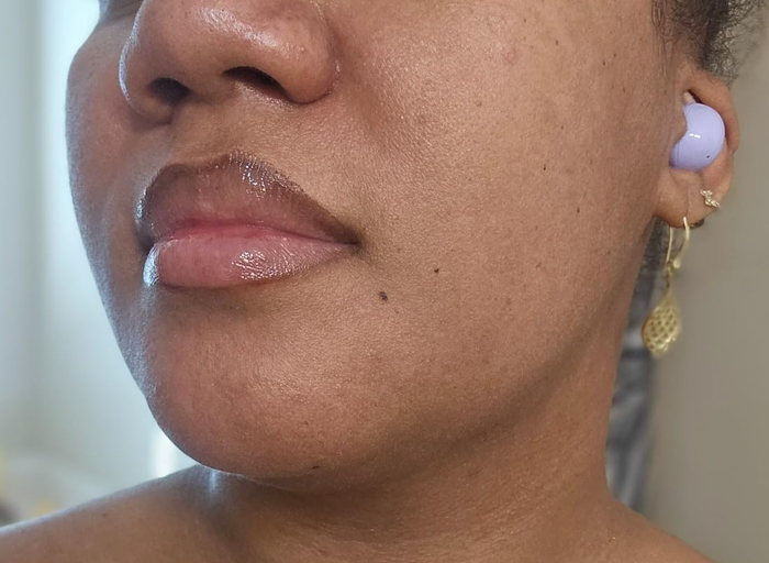 a reviewer sporting lip gloss