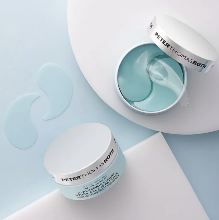 The light blue eye patches come with a handy spatula for easy application.