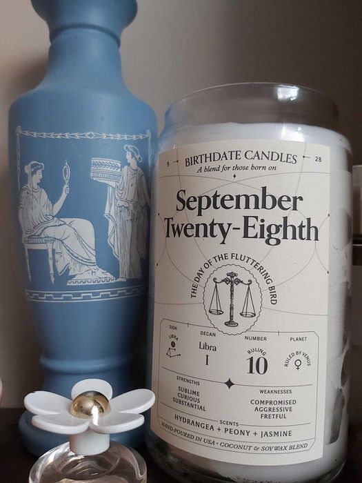 Mytourer's candle in a jar with the inscription that reads 