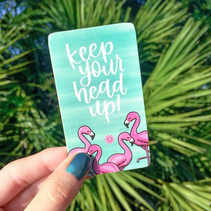 A blue card featuring the uplifting message 