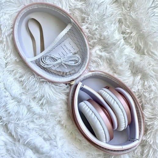 Mytour writer's pink headphones stored in their case