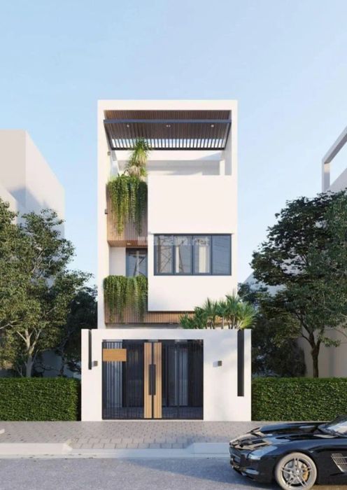 Mẫu nhà ống 3 tầng có sân thượng rộng lớn, thoáng đãng, mang đến không gian sống dễ chịu.