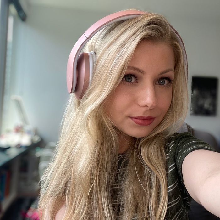 Mytour writer sporting pink headphones