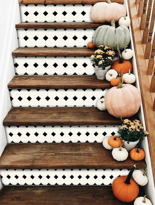 black and white tile-patterned decals applied to stairs