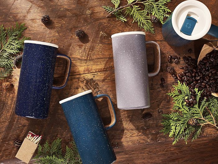 Three elegant mugs arranged on a table