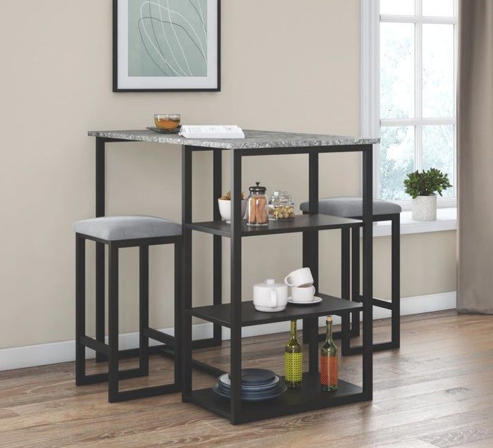 A sleek bar table with stools and storage, positioned by a window.