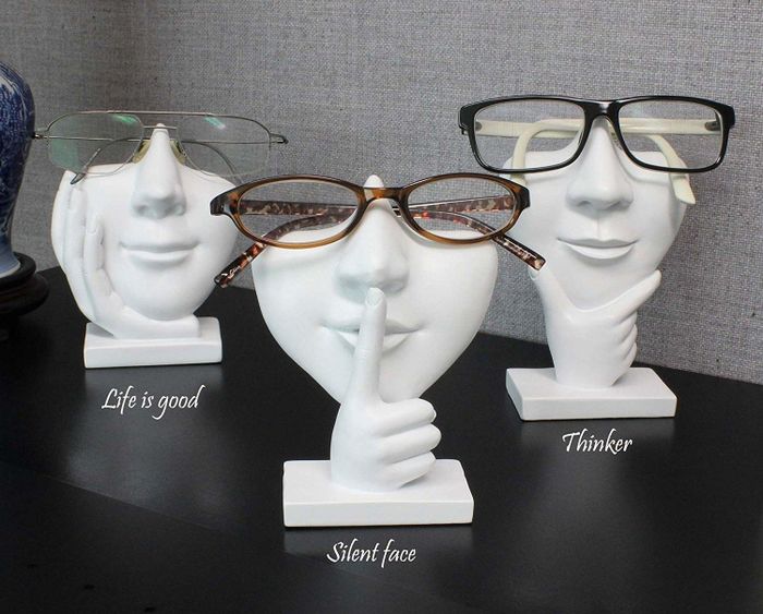 Three stylish eyeglass holders in action