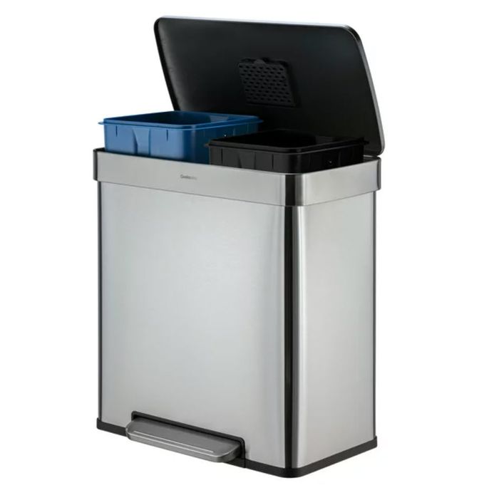 A stainless steel trash can with two compartments and foot pedals for hands-free use.