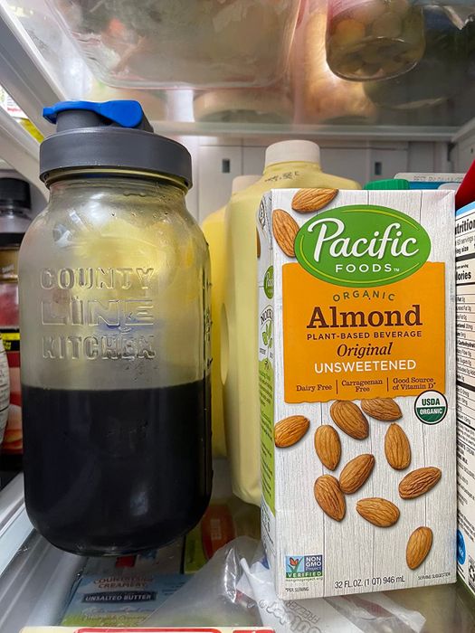 A jar of cold brew sitting in the fridge.