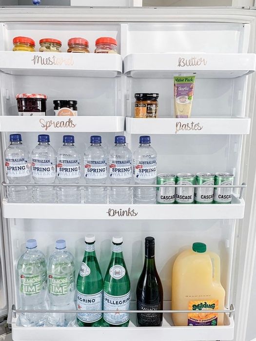 A photo of the inside of a fridge door with labels for organized storage.