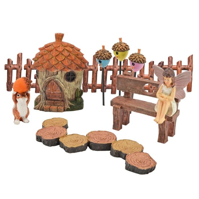 This kit includes various pieces to help you create a magical fairy garden setup.