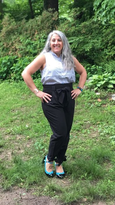 Another reviewer modeling the black pants