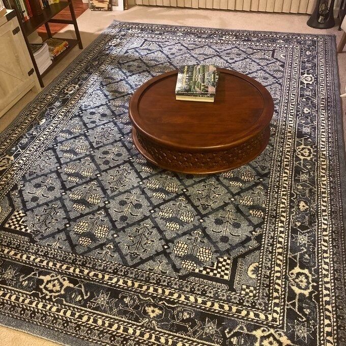 A reviewer’s home showcasing the stunning combination of blue and ivory in the rug.