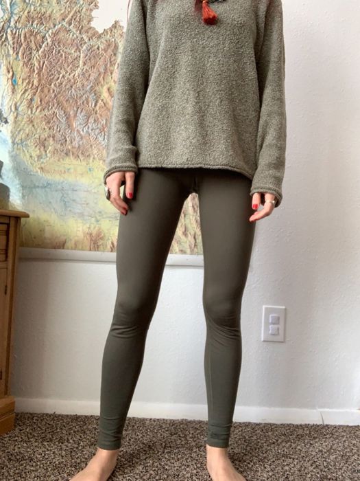 Another reviewer wearing the army green leggings