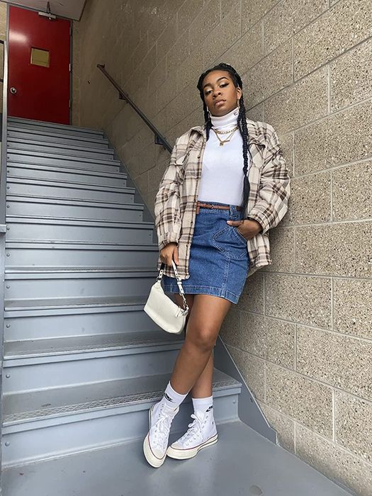 reviewer wearing the white and brown plaid shacket