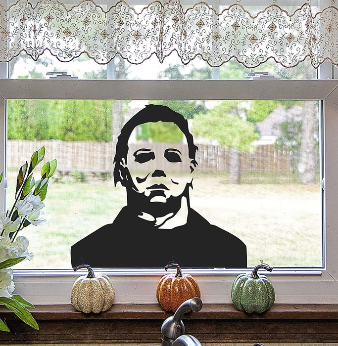 A silhouette of Michael Myers displayed on a window