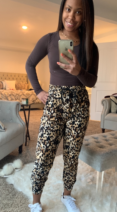 another reviewer wearing the leopard print leggings/joggers