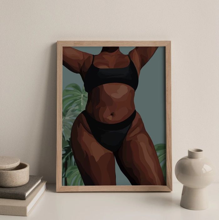 A print showcasing a Black figure is displayed