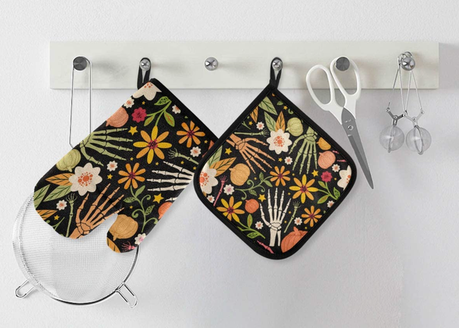 floral and skeleton hand-themed oven mitt and pot holder
