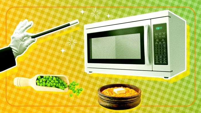 A magician’s hand and wand gently tap a microwave, with peas and potatoes magically floating in mid-air.