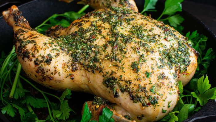 A turkey generously slathered with chimichurri seasoning.