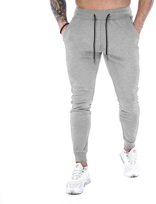Model sporting the grey joggers.