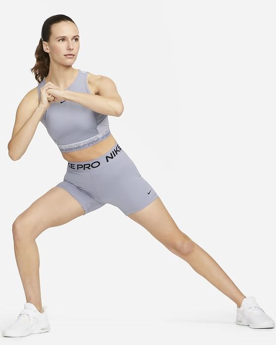 Image of model wearing gray shorts