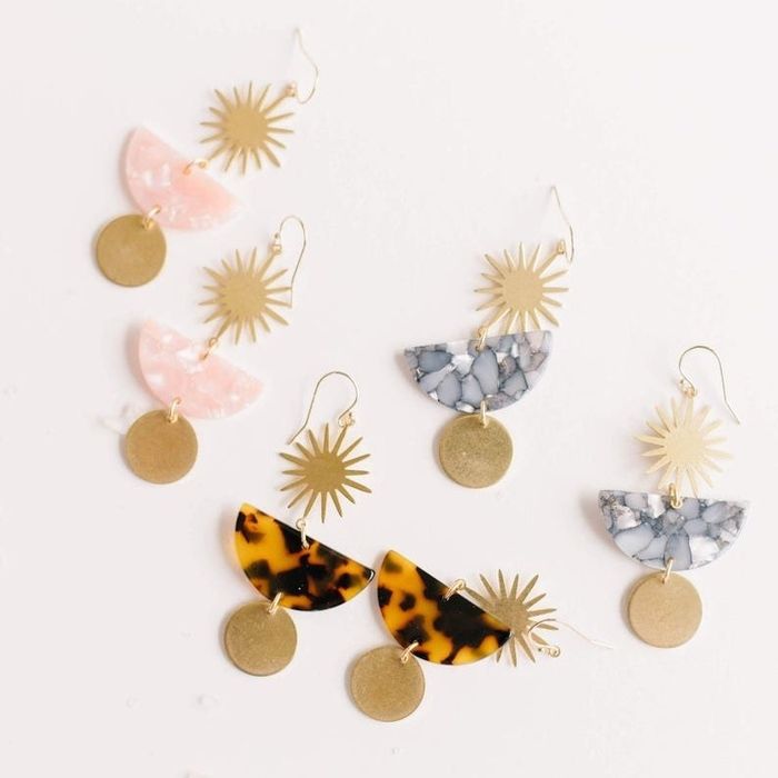 Three sets of the earrings in various acetate shades, including tortoise and blue