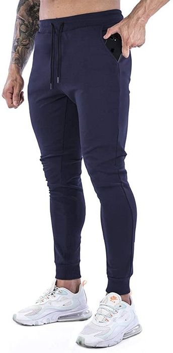 Model showing off the navy joggers.